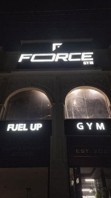 Force Gym Lahore signage at night